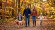 © Svitlana - Joyful young family walking with a cute dog in an autumn park, warm lifestyle scene with colorful foliage, togetherness and seasonal outdoor appeal for parenting, pets and wellbeing themes, polished