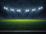 Vibrant green soccer field inside large stadium at night, brightly lit by powerful overhead floodlights creating dramatic beams of light. High quality photo