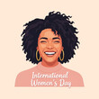 © Pajri - Vector illustration portrait of a happy smiling Black woman with dark curly natural hair wearing gold hoop earrings and pink top for International Women's Day holiday.