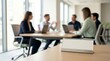 © Roman Stock studio - Blank Notebook on Conference Table During Modern Business Meeting Photo