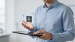 © Lucas - Businessman holding tablet artificial intelligence concept futuristic chip with AI text holographic interface icons cloud computing symbol data analytics chart settings gears