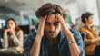 © Gold - Man holding head in hands while sitting in office chair ,people, women in stress, men sitting on the chair with sadness, people with burnout, stress , photo style