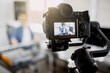 © Vlad - The live video blogger teaches how to make music tracks live. Video for social network or stream. DJ in broadcasting studio. music producer is composing a song in recording studio.