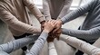 © Dunia - Teamwork, unity concept, group of friends put their hands together with copy space