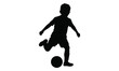 © Durjoy - Silhouette of a young boy kicking a soccer ball, representing sports and active childhood