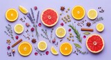 Citrus Fruits, Herbs and Spices Flat Lay on Purple Background