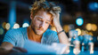 © Aliaksandra - Stressed man reading documents at home at night, worried about bills, debt, or financial problems