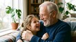 © Farah - Happy grandfather and granddaughter laughing together on sofa, warm indoor scene