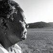 © MHC_Design - portrait featuring mature african american woman caught in a moment of calm reflection