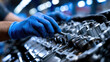 © Mrammon - Mechanic engine repair workshop maintenance industrial tool blue glove metal machinery mechanic engine repair workshop maintenance industrial tool blue glove metal machinery detail and focus