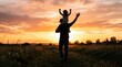 © Sumaya - Father and child silhouette enjoying a vibrant sunset in a meadow landscape
