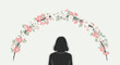 © Agus - Woman in silhouette under floral arch.