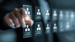 © retrostudio - Candidate Selection Concept in Human Resources featuring businessperson analyzing resumes on digital interface, choosing qualified applicant during online job application review process