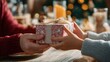 © sornram - A warm moment captured as a child and adult exchange a beautifully wrapped gift during the festive season, evoking joy and togetherness.