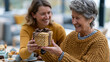 © pattozher - Gift of Warmth: A heartfelt moment shared between a mother and daughter, exchanging a beautifully wrapped gift. A scene of pure love, appreciation, and connection.