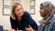 © Aurora Aesthetics - Female teacher listening student counseling classroom education mentoring support diversity empathy attentive white woman educator hearing a black teenage girl share her concerns during a school chat