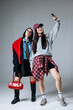 © wedmoments.stock - Two fashionable women posing for selfie photo on smartphone, isolated background. Concept social media, happiness and connection.