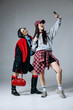© wedmoments.stock - Stylish female friends taking smartphone selfie on isolated background. Concept friendship, lifestyle and modern technology.
