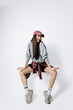 © wedmoments.stock - Fashion portrait of female model in stylish streetwear outfit on isolated background. Concept commercial advertising and lifestyle.