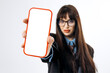 © wedmoments.stock - A woman in a business suit holds a smartphone with a blank screen, demonstrating the mobile device as part of a commercial lifestyle concept on a plain white background.