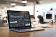 © TAlex - Laptop with analytics dashboard on modern office desk