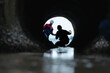 © Wosunan - Industrial inspector monitoring wastewater drainage tunnel