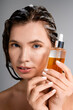 © LIGHTFIELD STUDIOS - Charming portrait of a young woman revealing luminous hair care secrets
