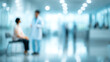 © Subin - A blurred scene of a medical consultation in a modern hospital, emphasizing patient and doctor interaction.