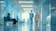 © Subin - A busy hospital corridor filled with patients and medical staff moving through the bright and sterile environment.