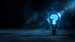 © Bonsales - Light bulb glowing blue, containing question mark, symbolizing concept of queries, uncertainty, innovation, and discovery