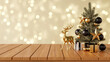 © Muzamil - Miniature Christmas tree with gold star toppers and elegant black ornaments standing beside a golden reindeer decorative figurine display piece