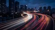 © Michelle - Dynamic city highway at night, long exposure captures vibrant light trails from moving vehicles, urban skyline.