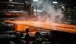 © Justlight - Focused medium shot capturing a long steel strip glowing orange as light cooling spray mists the surface with blurred machinery and steam in the background.