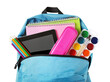 © Diego - Isolated blue school backpack packed with colorful education and art supplies for children