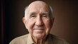 © buraratn - Portrait of an elderly man with a gentle smile, showcasing wisdom and experience in a warm, soft-lit environment, emphasizing age and character.