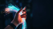 © Preeyanuch - Hand holds vibrant fiber optic cables showcasing technology and innovation in AI and software