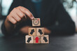 © Nirusmee - Business growth concept with hand stacking wooden blocks upward, representing strategy, goal achievement, leadership, development, planning, and long-term business success.