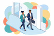 © nana - Colleagues walking and talking in a modern office hallway