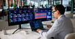 © Andrey Popov - Man Uses Laptop To Monitor Real-time Network Performance