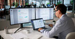 © Andrey Popov - Office Manager Organizes Files On Computer