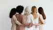 © ink drop - A group of women hugging close together. Female community and support