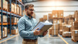 © Sergej - Man checking inventory documents in warehouse