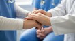 © siam - Closeup of a doctor comforting a patient by holding their hands