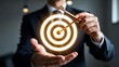 © Ganesha88 - Achieving business goals with digital art target visualization in professional settings