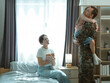 © Aphisara - The soldier returned home to surprise his family; his daughter ran to hug him.