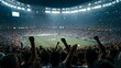 © Oleh - Crowd of fans raising fists and celebrating during a thrilling soccer match in a large, brightly lit stadium, creating an atmosphere of excitement and unity