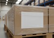 © twilight mist - Cardboard Boxes Wrapped in Plastic on Wooden Pallet with Blank Label i