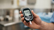 © Maksym - Person checks blood glucose level with a modern glucometer in a clinical setting.