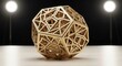 © NurBalqis - Intricate Brass Geometric Sculpture on Table Surface