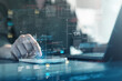 © Garun Studios - Hand using digital interface with charts and database icons, representing data analytics, big data systems, AI insights, software management and business intelligence.